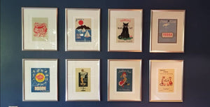 Wall with colorful framed Vintage Menu Art